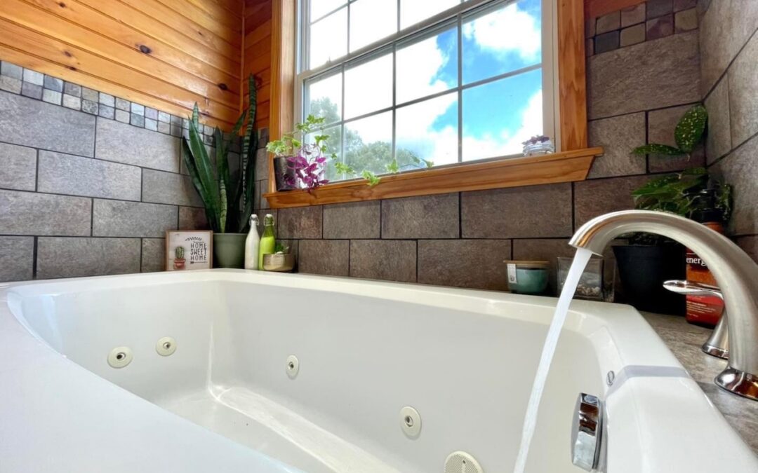 Photo of a soaker tub with spa jets filling with water